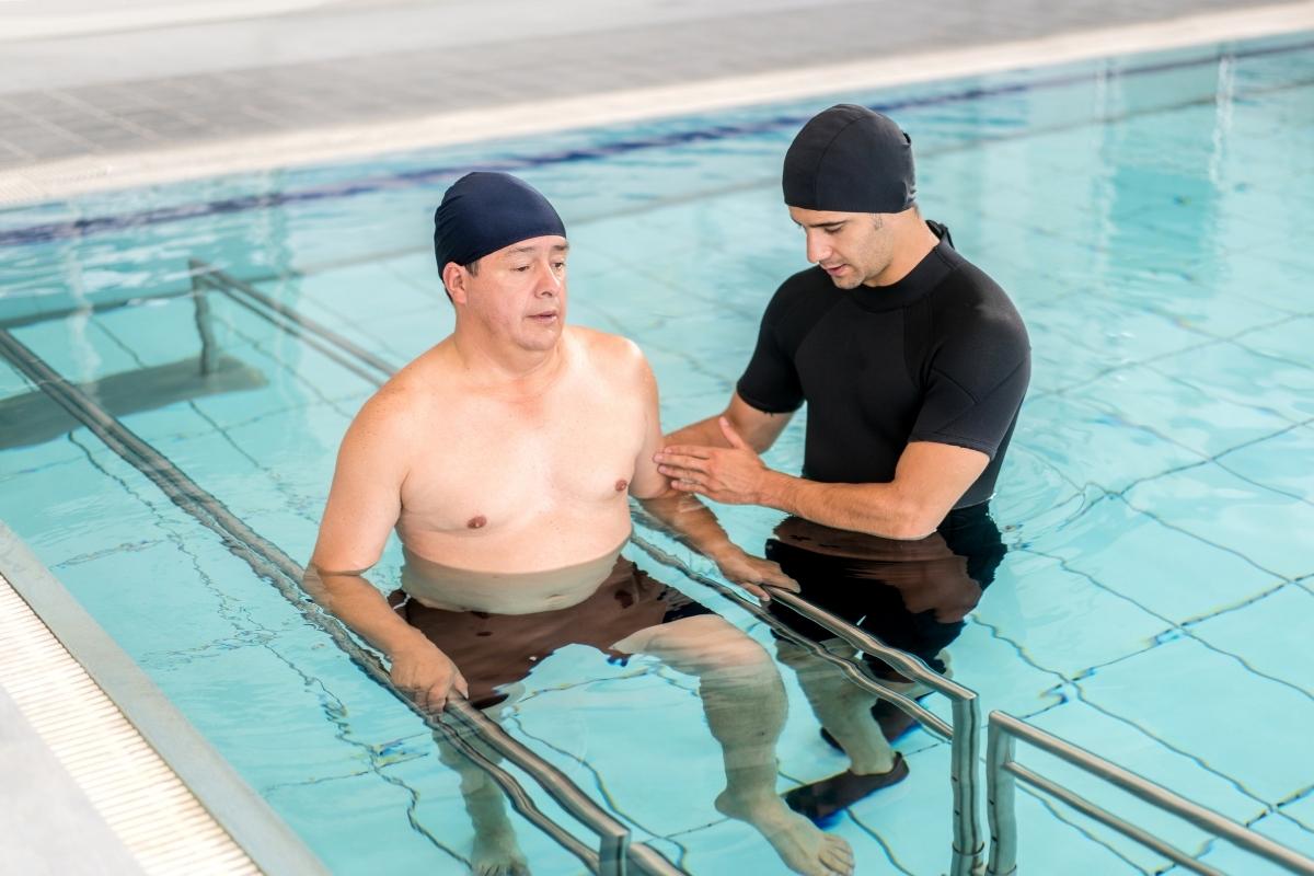 Man doing rehab in water